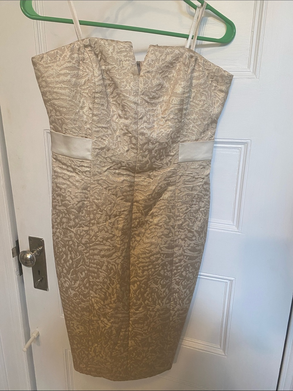 Gold brocade strapless cocktail dress.